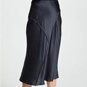 VINCE: RAW-EDGE SILK MIDI SKIRT